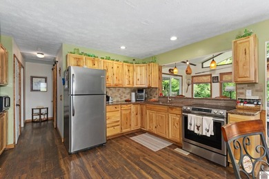 Enjoy year-round views of Lake Barkley from both the front and - photo 17