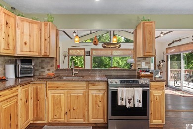Enjoy year-round views of Lake Barkley from both the front and - photo 18