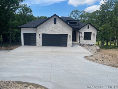WOW Setting! New Construction! Sitting on over 1/2 an acre, this - photo 45