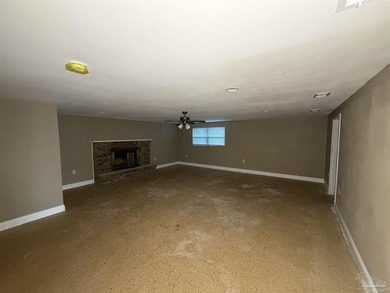 This 3 bedroom, 2 bath house features new appliances, updated - photo 3