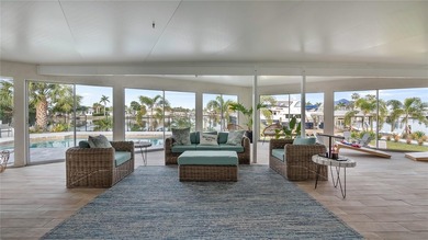 Set along an extraordinary 149 feet of water frontage, 102 E - photo 12