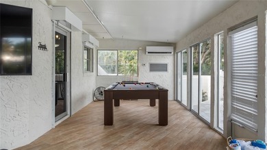 Set along an extraordinary 149 feet of water frontage, 102 E - photo 15