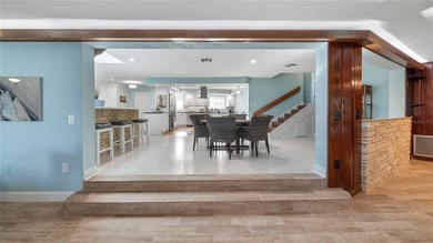 Set along an extraordinary 149 feet of water frontage, 102 E - photo 25