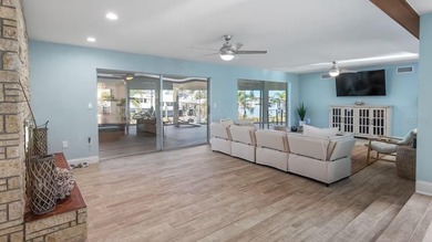 Set along an extraordinary 149 feet of water frontage, 102 E - photo 26