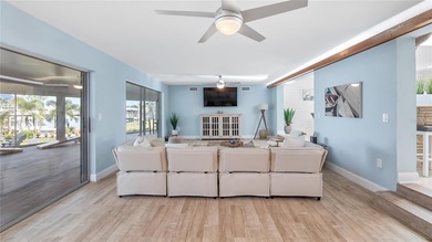 Set along an extraordinary 149 feet of water frontage, 102 E - photo 27