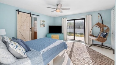 Set along an extraordinary 149 feet of water frontage, 102 E - photo 40