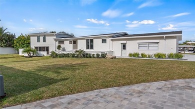 Set along an extraordinary 149 feet of water frontage, 102 E - photo 46