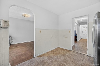 Refreshed and charming 3-bedroom tri-level brick home features a - photo 12