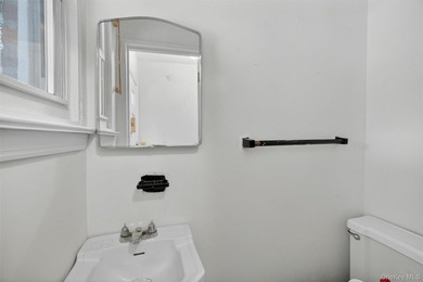 Refreshed and charming 3-bedroom tri-level brick home features a - photo 13