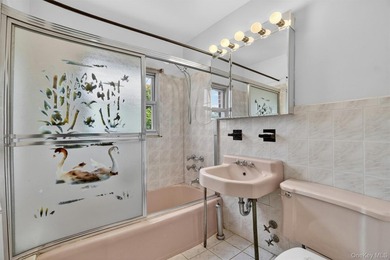 Refreshed and charming 3-bedroom tri-level brick home features a - photo 18