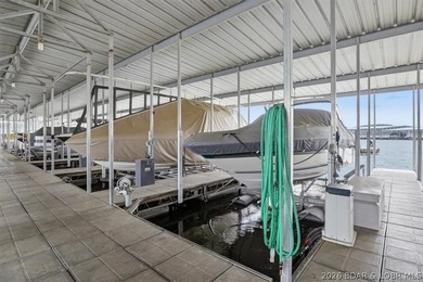 36 Foot Boat Slip with Polylift Hoist, a PWC Slip and a fully - photo 35