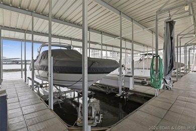 36 Foot Boat Slip with Polylift Hoist, a PWC Slip and a fully - photo 36