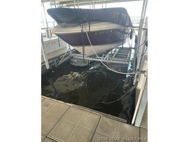 36 Foot Boat Slip with Polylift Hoist, a PWC Slip and a fully - photo 47