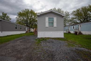 This charming 3-bedroom, 2 full bath single-wide home offers - photo 2