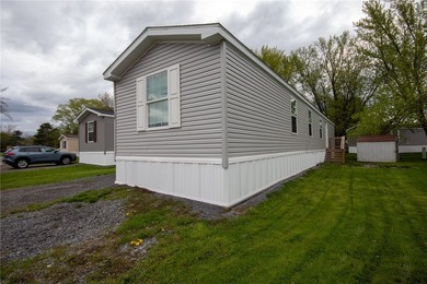 This charming 3-bedroom, 2 full bath single-wide home offers - photo 3