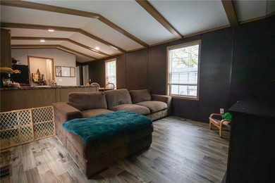 This charming 3-bedroom, 2 full bath single-wide home offers - photo 4