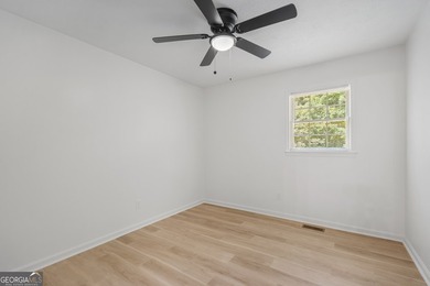 Fully remodeled and move-in ready, this updated 1980s - photo 12