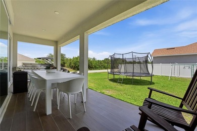 Discover refined coastal living in this beautifully designed - photo 34