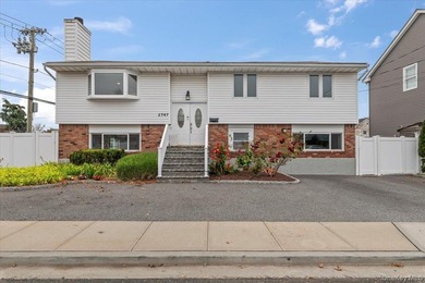 Waterfront Living in the Heart of Bellmore! Welcome to this - photo 1