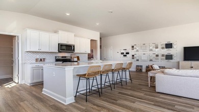 This Eaton home is a chef and entertainer's dream! With a large - photo 13