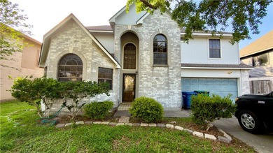 This charming one-owner brick home offers a versatile layout - photo 1