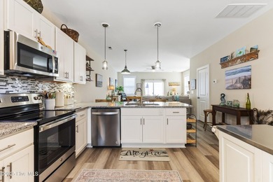 Welcome to this beautifully maintained END unit offering the - photo 22
