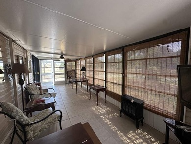 This charming 640 square feet mobile home offers a cozy and - photo 2