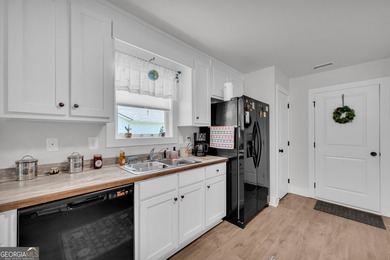 Welcome home! This ALMOST NEW, built in 2024, 3-bedroom, 2-bath - photo 26