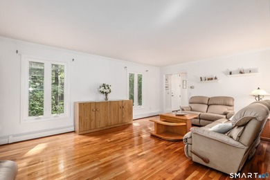 Nestled on a private, beautifully landscaped lot in the highly - photo 12