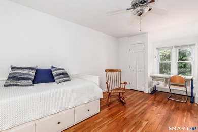 Nestled on a private, beautifully landscaped lot in the highly - photo 17