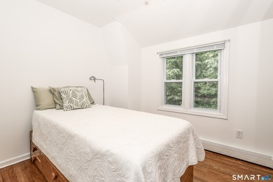 Nestled on a private, beautifully landscaped lot in the highly - photo 19