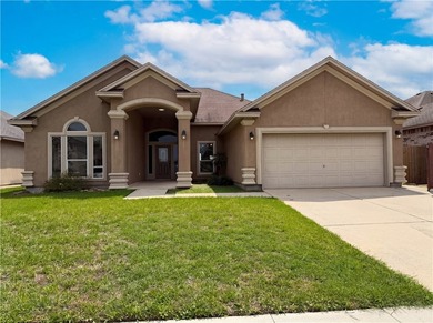 Welcome to 5721 Loire Blvd, a home that exudes warmth and - photo 1