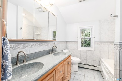 Nestled on a private, beautifully landscaped lot in the highly - photo 21
