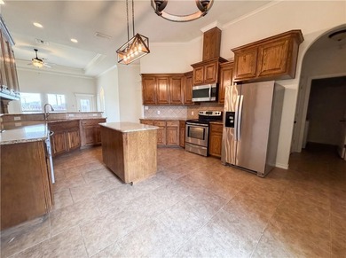 Welcome to 5721 Loire Blvd, a home that exudes warmth and - photo 2