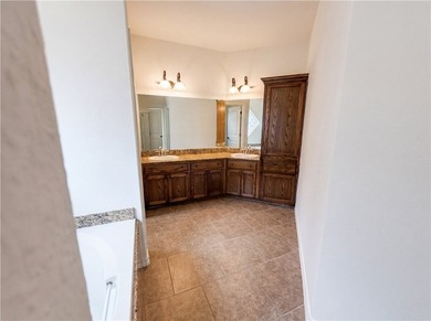 Welcome to 5721 Loire Blvd, a home that exudes warmth and - photo 9