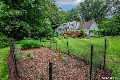Nestled on a private, beautifully landscaped lot in the highly - photo 29