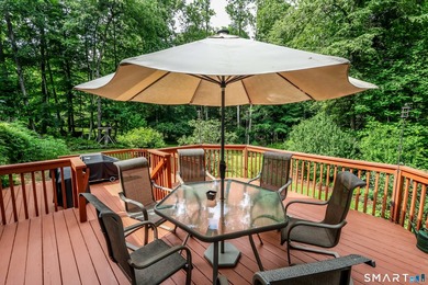 Nestled on a private, beautifully landscaped lot in the highly - photo 31