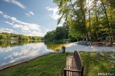 Nestled on a private, beautifully landscaped lot in the highly - photo 35