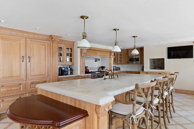 A rare blend of timeless elegance and modern indulgence, this - photo 8