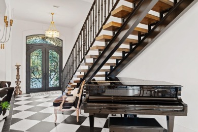 Stunning custom estate featuring three structures--main home