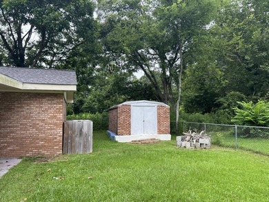 Welcome to this versatile 4-bedroom, 2-bath home offering space - photo 12