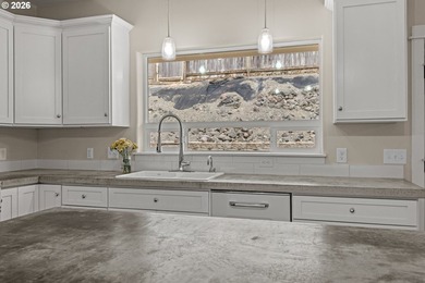 Experience modern coastal living in this custom-built 2023 home - photo 25