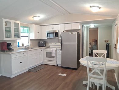 This home has 2 bedrooms and 1-1/2 baths and was completely - photo 8
