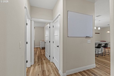 Experience modern coastal living in this custom-built 2023 home - photo 30