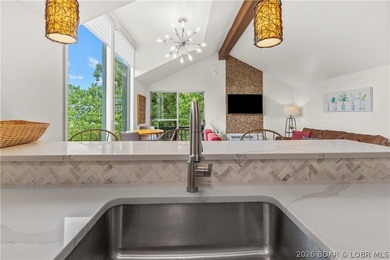 Experience the ultimate Lake of the Ozarks lifestyle in this - photo 11