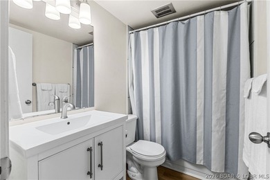 Experience the ultimate Lake of the Ozarks lifestyle in this - photo 17