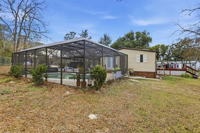 Set on just over half an acre, this 1989 double-wide mobile home - photo 34