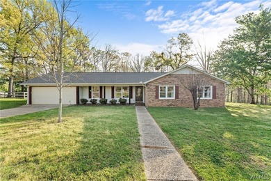 Located near Lake Tuscaloosa, this home offers private lake - photo 1