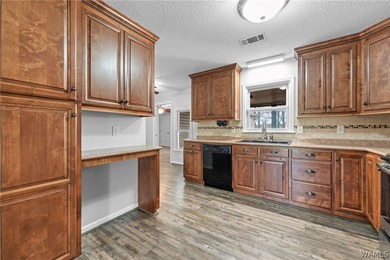 Located near Lake Tuscaloosa, this home offers private lake - photo 7