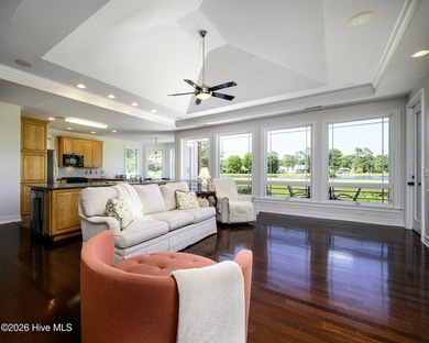 Sunlight pours through oversized windows, casting peaceful water - photo 2